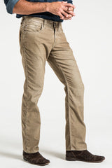 Corduroy jeans rustic man close up side view