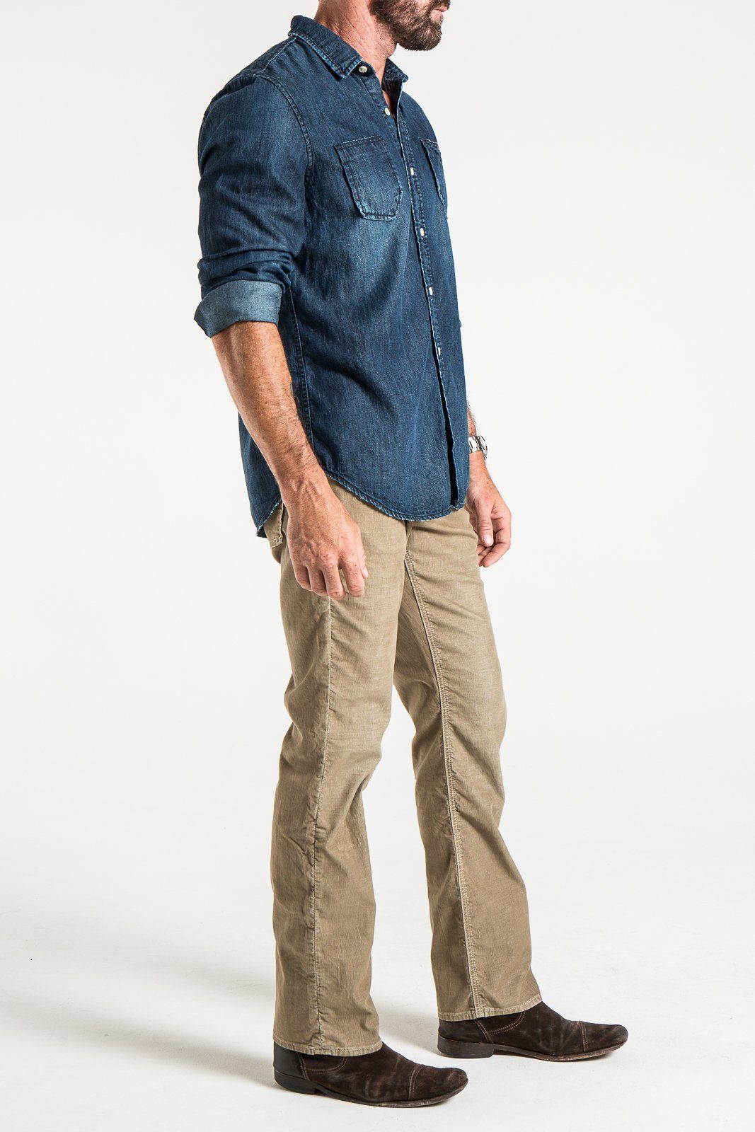 Corduroy jeans rustic man standing sideways